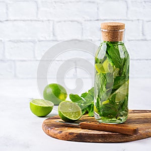 Fresh cool lemon lime mint infused water detox drink