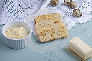 Fresh corn bread on a blue background.