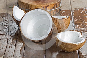 Fresh cracked coconuts with white meat ready to eat