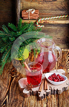 Fresh cranberry juice. The compote. Hot Christmas drink from the berries with cinnamon and star anise