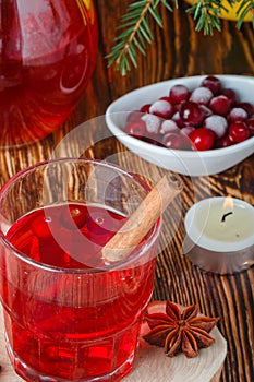 Fresh cranberry juice. The compote. Hot Christmas drink from the berries with cinnamon and star anise