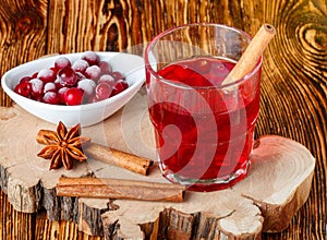 Fresh cranberry juice. The compote. Hot Christmas drink from the berries with cinnamon and star anise