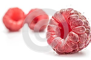 Fresh crimson raspberry isolated on white