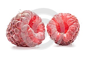 Fresh crimson raspberry isolated on white