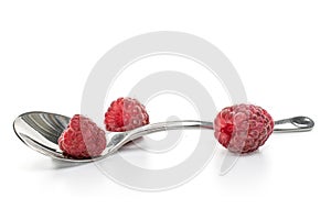 Fresh crimson raspberry isolated on white