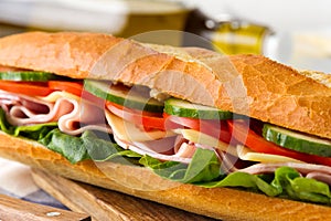 Fresh crispy baguette filled with ham, crunchy lettuce, sweet tomatoes, juicy cucumber, aromatic cheese and mayonnaise