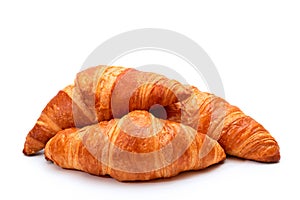 Fresh crispy croissants on a white background. French pastries