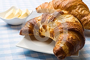 Fresh croissant with butter