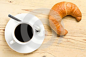 Fresh croissant with coffee
