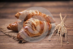 Fresh Croissant, italian breakfast. Close up.