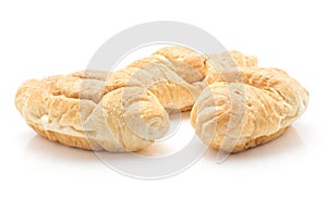 Fresh croissant on white