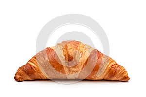 Fresh croissant on a white isolated background, closeup. French pastries