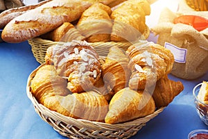 Fresh croissants in a basket