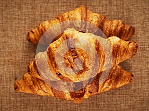 Fresh croissants on a dark background