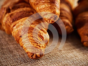 Fresh croissants on a dark background