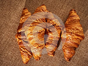 Fresh croissants on a dark background