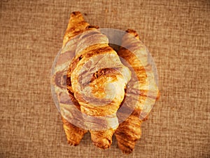 Fresh croissants on a dark background