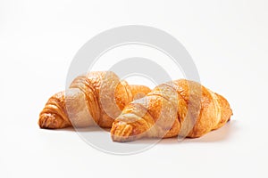 Fresh croissants isolated on white background