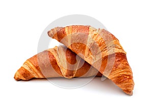 Fresh croissants on a white background close-up. French pastries
