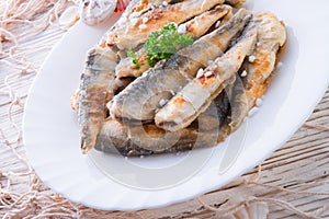Crossly inlaid fried herrings