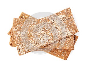 Fresh crunchy rye crispbreads isolated on white, top view
