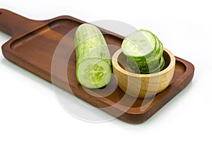Fresh cucumber sliced on Wooden tray