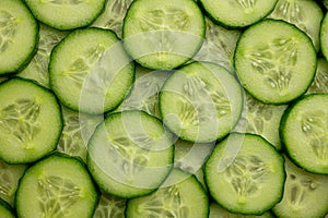 Fresh cucumber slices background. Healthy organic food