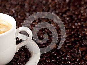 Fresh cup of dark roasted coffee