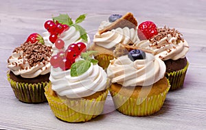 Fresh cupcakes with fresh berries