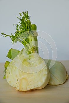 Fresh cut fennel on white cutting board