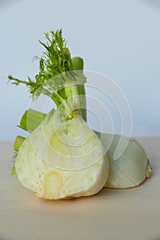 Fresh cut fennel on white cutting board