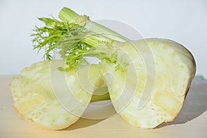 Fresh cut fennel on white cutting board