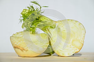 Fresh cut fennel on white cutting board