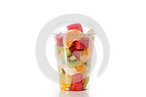 Fresh cut fruit in a plastic cup