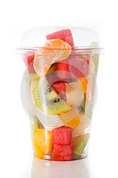 Fresh cut fruit in a plastic cup