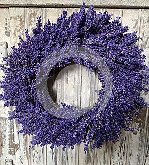 Fresh cut homemade lavender wreath in white door