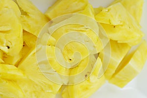 Fresh cut pieapple on white background, detail