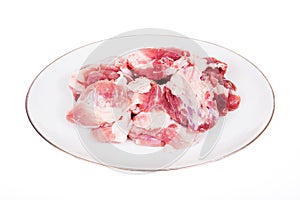 Fresh damp meat on plate insulated