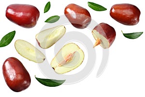 fresh date fruit with sleces and leaves isolated on white background. top view