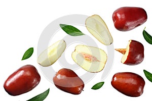 fresh date fruit with sleces and leaves isolated on white background. top view