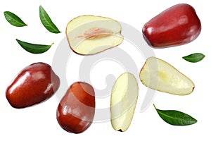 Fresh date fruit with sleces and leaves isolated on white background. top view