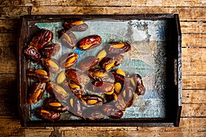 Fresh dates with almonds on a table