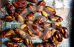 Fresh dates with almonds on a table
