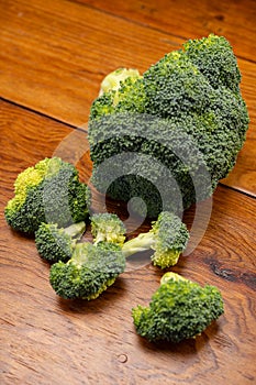 Fresh delicious broccoli on a wooden table