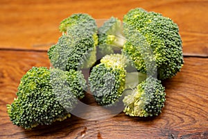 Fresh delicious broccoli on a wooden table