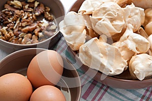 Fresh delicious brown meringue and ingredients