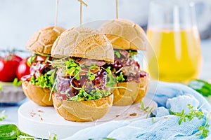 Fresh delicious burgers in Form of Football soccer,