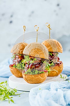 Fresh delicious burgers in Form of Football soccer