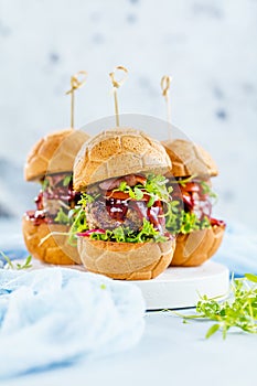 Fresh delicious burgers in Form of Football soccer