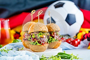 Fresh delicious burgers in Form of Football soccer